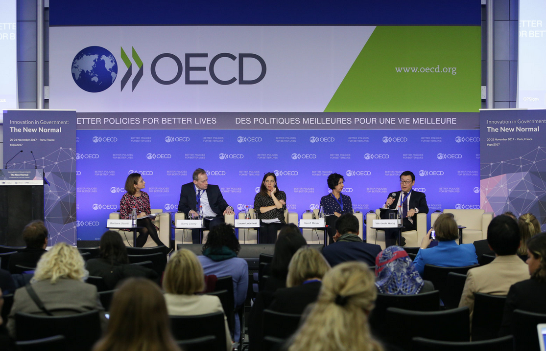 Foto de reunión de la OCDE
